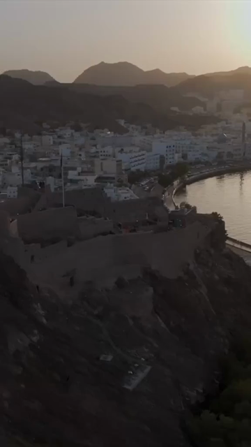 Vertical Aerial Evening View of Al Jalali Fort Old Muscat Oman