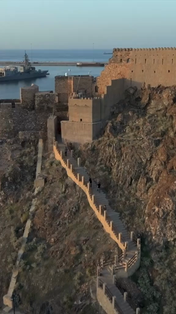 Vertical Aerial Evening View of Al Jalali Fort Old Muscat Oman