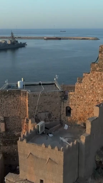 Vertical Aerial Evening View of Al Jalali Fort Old Muscat Oman