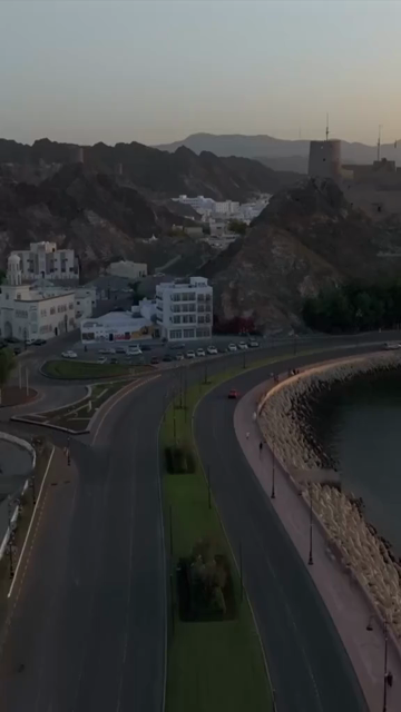 Vertical Aerial Evening View of Al Jalali Fort Old Muscat Oman