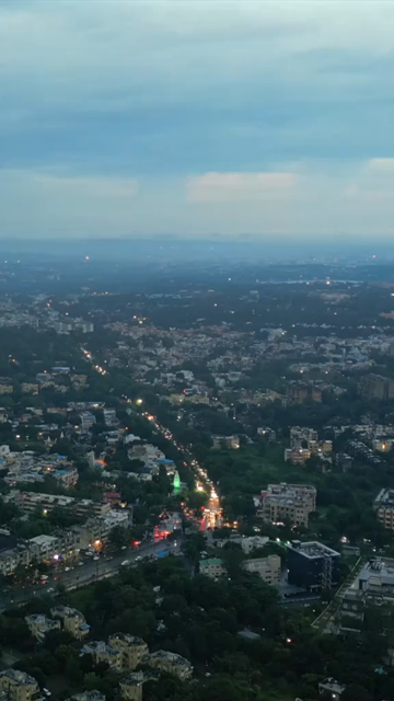 Vertical Aerial Evening View of Bhopal Cityscape