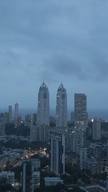 Vertical Aerial Night View of Imperial Towers and Mumbai Cityscape