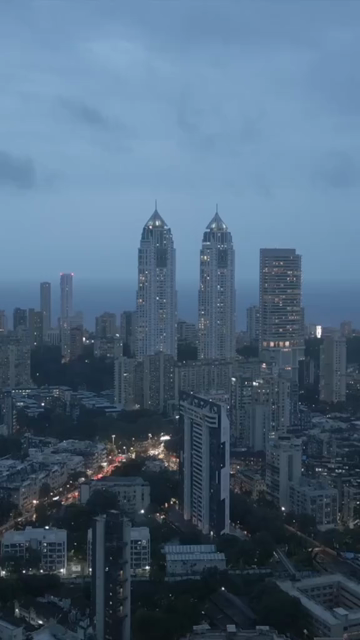 Vertical Aerial Night View of Imperial Towers and Mumbai Cityscape