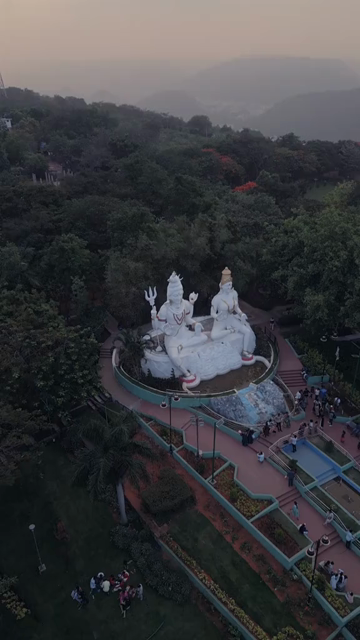 Vertical Aerial Night View of Kailasagiri Shiva Parvati Statue Visakhapatnam