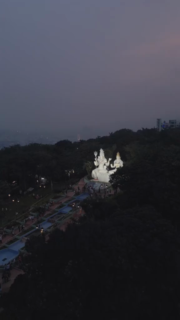 Vertical Aerial Night View of Kailasagiri Shiva Parvati Statue Visakhapatnam