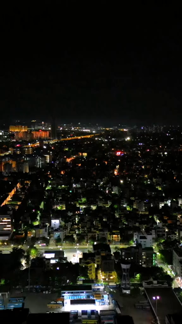 Vertical Aerial Night View of Kolkata City and Urban Infrastructure, India