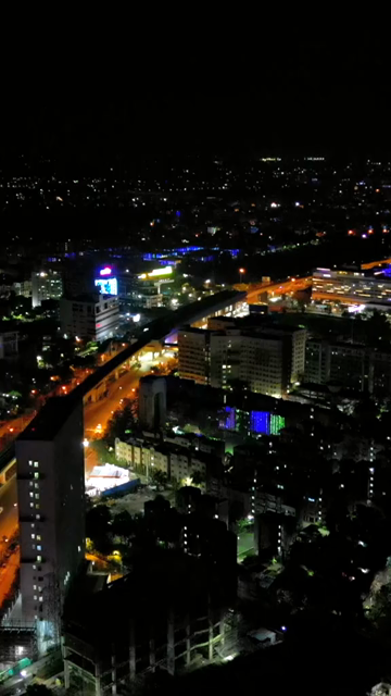 Vertical Aerial Night View of Kolkata City and Urban Infrastructure, India