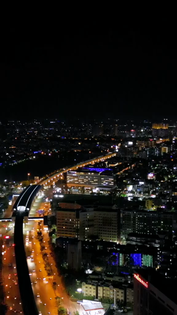 Vertical Aerial Night View of Kolkata City and Urban Infrastructure, India