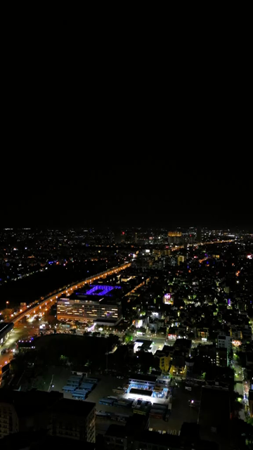 Vertical Aerial Night View of Kolkata City and Urban Infrastructure, India