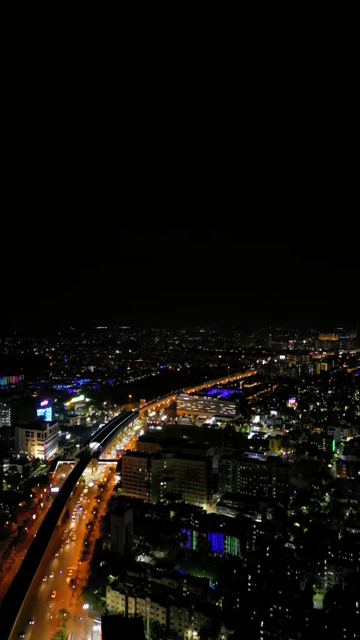 Vertical Aerial Night View of Kolkata City and Urban Infrastructure, India