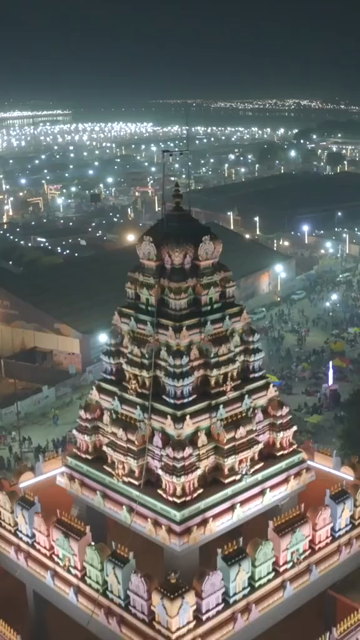 Vertical Aerial Night View of Maha Kumbh Mela 2025 in Prayagraj, India