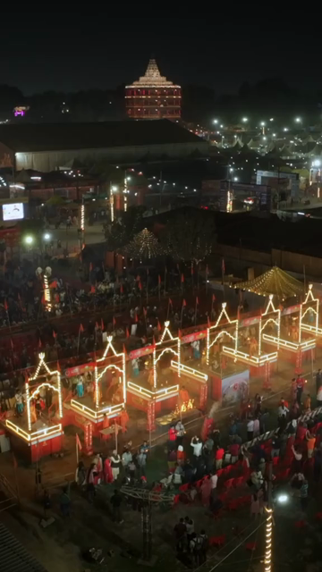 Vertical Aerial Night View of Maha Kumbh Mela 2025 in Prayagraj, India
