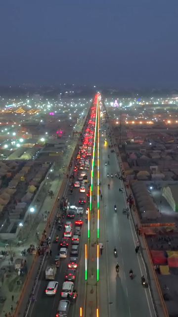 Vertical Aerial Night View of Maha Kumbh Mela 2025 in Prayagraj, India