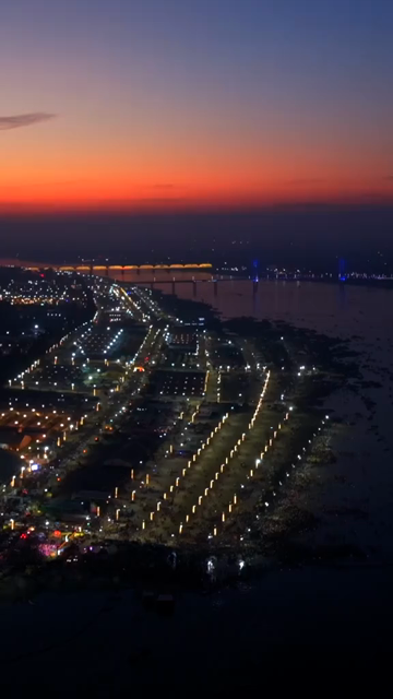 Vertical Aerial Night View of Maha Kumbh Mela 2025 in Prayagraj, India
