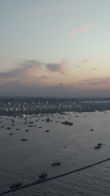 Vertical Aerial Night View of Maha Kumbh Mela 2025 in Prayagraj, India