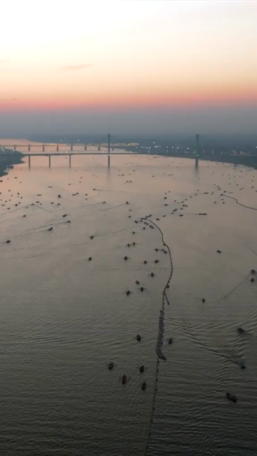 Vertical Aerial Night View of Maha Kumbh Mela 2025 in Prayagraj, India