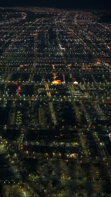 Vertical Aerial Night View of Maha Kumbh Mela 2025 in Prayagraj, India