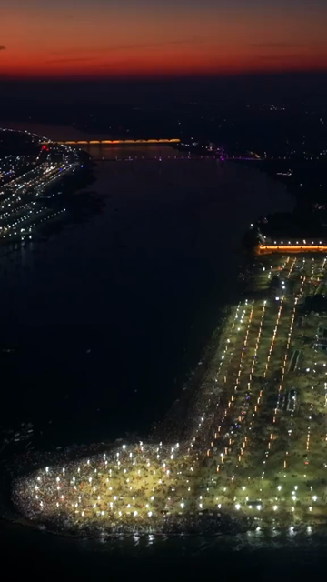 Vertical Aerial Night View of Maha Kumbh Mela 2025 in Prayagraj, India