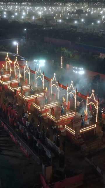 Vertical Aerial Night View of Maha Kumbh Mela 2025 in Prayagraj, India