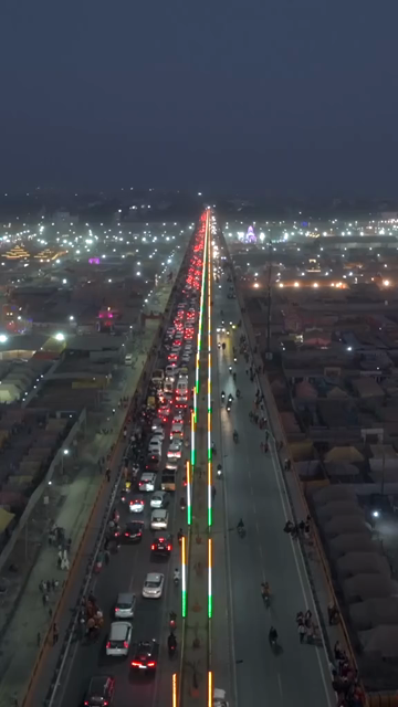 Vertical Aerial Night View of Maha Kumbh Mela 2025 in Prayagraj, India