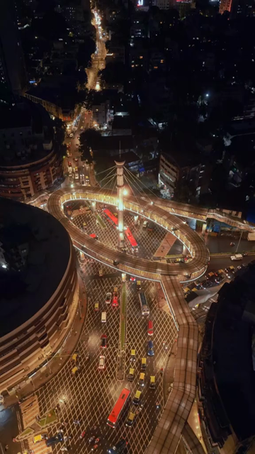 Vertical Aerial Night View of Nana Chowk Skywalk and Mumbai Cityscape