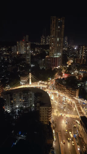 Vertical Aerial Night View of Nana Chowk Skywalk and Mumbai Cityscape
