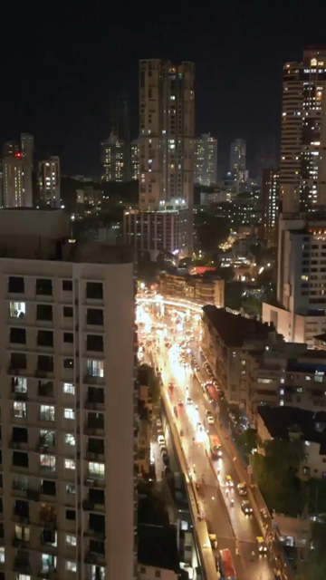 Vertical Aerial Night View of Nana Chowk Skywalk and Mumbai Cityscape