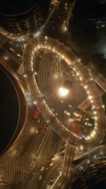 Vertical Aerial Night View of Nana Chowk Skywalk and Mumbai Cityscape