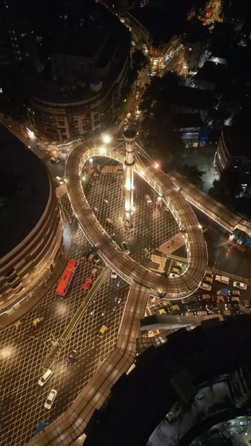 Vertical Aerial Night View of Nana Chowk Skywalk and Mumbai Cityscape