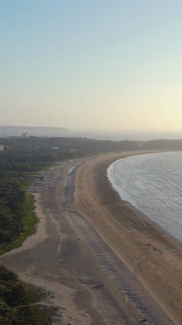 Vertical Aerial Shot of Miramar Beach Goa India
