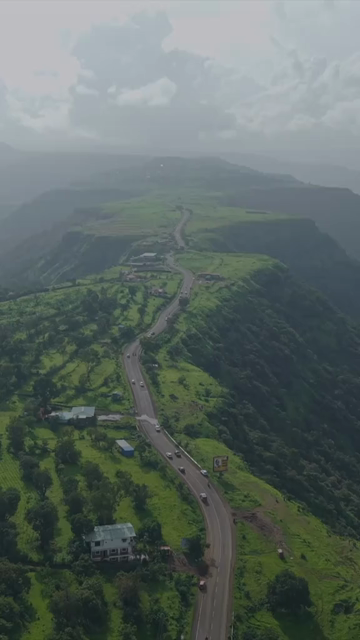 Vertical Aerial View of Ajinkyatara Fort and Lush Green Hills Satara Maharashtra India