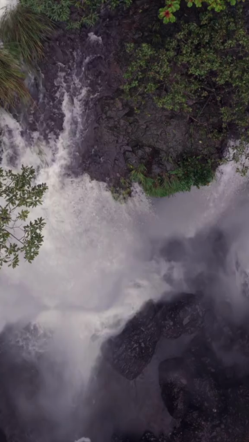 Vertical Aerial View of Barki Waterfall Amid Lush Green Forest Kolhapur Maharashtra