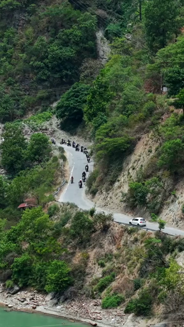 Vertical Aerial View of Bikers Riding Along Chamera Lake Road, Himachal Pradesh