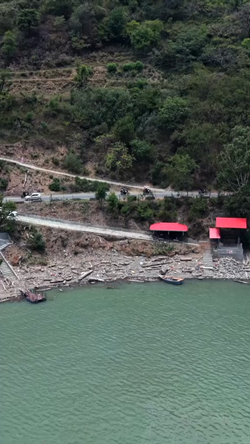 Vertical Aerial View of Bikers Riding Along Chamera Lake Road, Himachal Pradesh