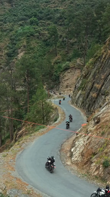 Vertical Aerial View of Bikers Riding Along Chamera Lake Road, Himachal Pradesh