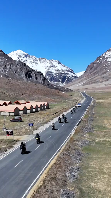 Vertical Aerial View of Bikers Riding Through the Landscapes of Ladakh India