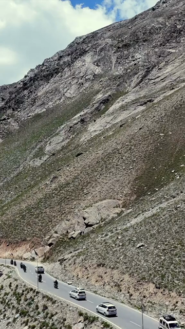 Vertical Aerial View of Bikers Riding Through the Landscapes of Ladakh India