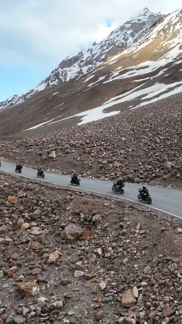Vertical Aerial View of Bikers Riding on a Mountain Road in Ladakh, Indian Himalayas