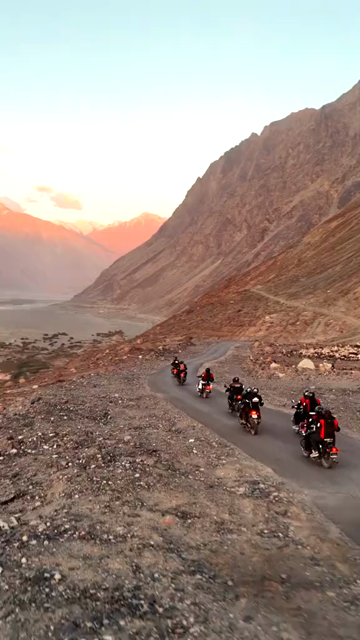 Vertical Aerial View of Bikers Riding on a Mountain Road in Ladakh, Indian Himalayas