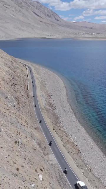 Vertical Aerial View of Tourist Bikers at Pangong Lake Ladakh India