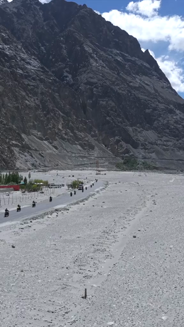 Vertical Aerial View of Bikers on Mountain Road in Ladakh India