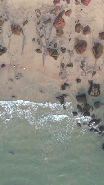 Vertical Aerial View of Bogmalo Beach and Rocky Coastline Near Vasco da Gama Goa