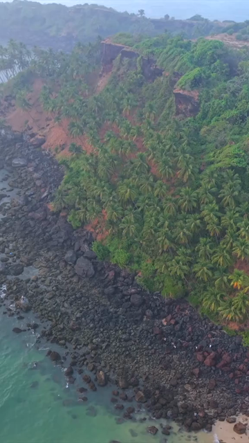 Vertical Aerial View of Bogmalo Beach and Rocky Coastline Near Vasco da Gama Goa
