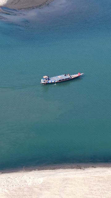 Vertical Aerial View of Boat on Brahmaputra River in Assam India