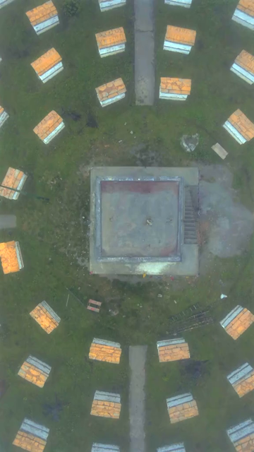 Vertical Aerial View of Mandala Top Buddhist Stupas Covered in Fog in Arunachal Pradesh India