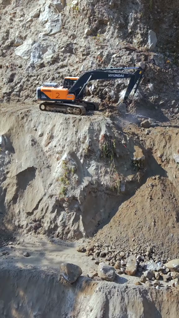 20th April 2026 : Vertical Aerial View of Mountain Road Construction and Landslide Clearing in India