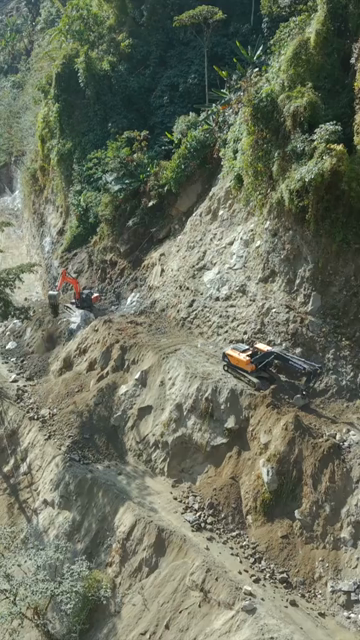 20th April 2026 : Vertical Aerial View of Mountain Road Construction and Landslide Clearing in India