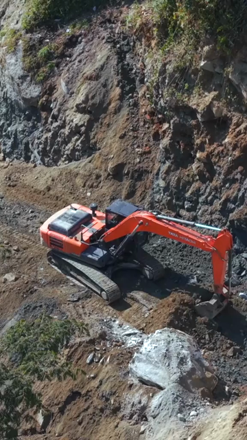 20th April 2026 : Vertical Aerial View of Mountain Road Construction and Landslide Clearing in India