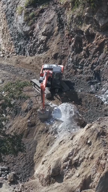 20th April 2026 : Vertical Aerial View of Mountain Road Construction and Landslide Clearing in India
