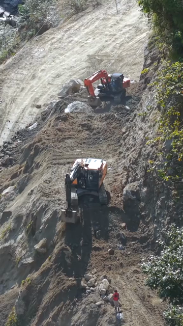 20th April 2026 : Vertical Aerial View of Mountain Road Construction and Landslide Clearing in India